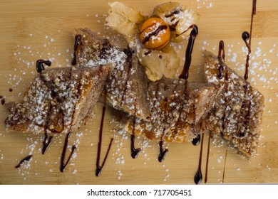 Asian Traditional Sweets Dessert Served On Wooden Plate.