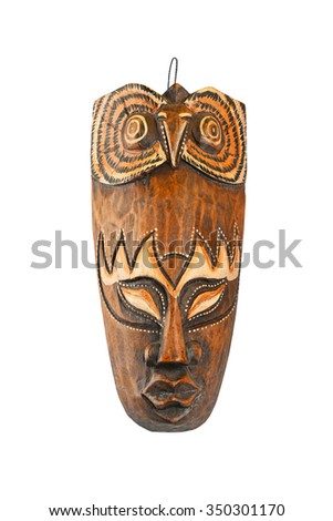 Asian traditional wooden painted brown mask with face of human and owl isolated on white