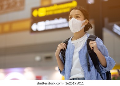 Asian Travelers Girl With Medical Face Mask To Protection The Coronavirus In Airport 