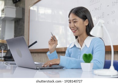 Asian university teachers are teaching mathematics with laptop to record live on internet, Long-distance study due to the virus epidemic situation, Online remote learning, Quarantine for people.