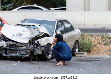 Asian Upset Driver Woman In Front Of Automobile Crash Car Collision Accident In City Road