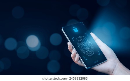 Asian using mobile smartphone scanning  face ID to unlock phone security access with facial recognition technology for biometric identification, future home living luxury tech.