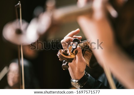 Asian Violin Playing Hands Close Up