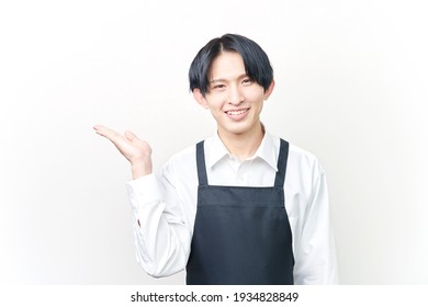 Asian Waiter Pointing Side On White