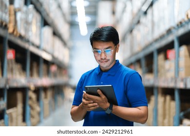 Asian warehouse employees who are confident in large warehouses, distribution centers, logistics systems. logistics system distribution center. - Powered by Shutterstock