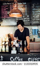 Asian Woman 40s White Skin Plump Body Is Coffee Shop Owner Work As A Cashier Service To Customers In The Coffee Shop Cafe