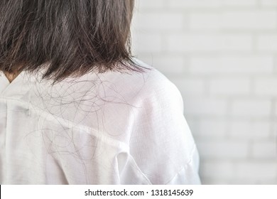  Asian Woman Back With Problem Hair Loss Falling On Neck And Shoulder 