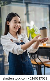 Asian Woman Barista Holding Coffee Cup Serving Customers At Coffee Shop Starting A Small Business Owner Food And Beverage Ideas.