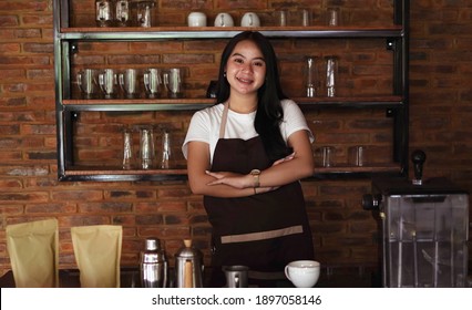 Asian Woman Barista Smilling Look Camera At Cafe