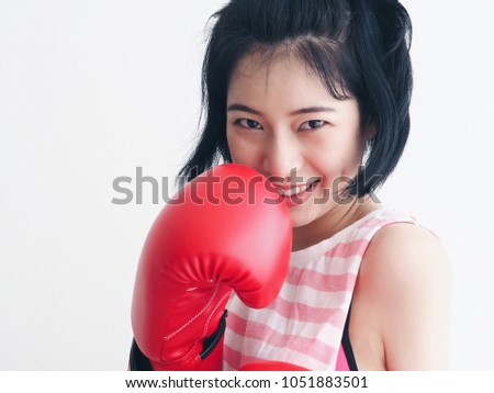 Asian woman with boxing training.