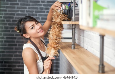 Asian Woman Cleaning House Happy Mood,focus On Face