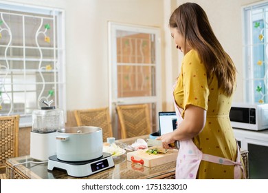 Asian Woman Cooking Lunch Kitchen Stock Photo 1751323010 | Shutterstock