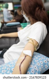 Asian Woman Donate Blood At A Hospital Blood Bank Laboratory As A Charity