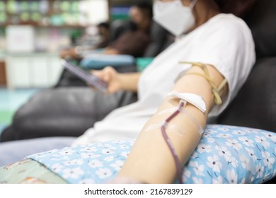 Asian Woman Donate Blood At A Hospital Blood Bank Laboratory As A Charity