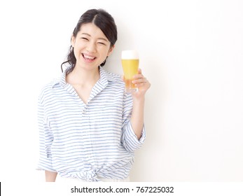 Asian Woman Drinking The Beer