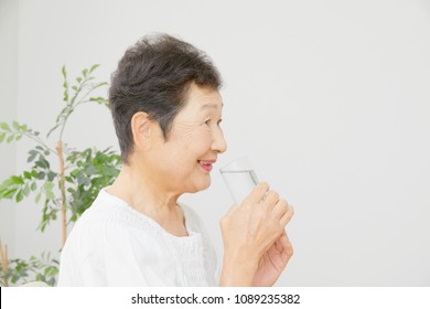 Asian Woman Drinking Water