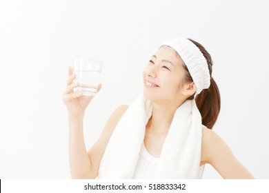 Asian Woman Drinking The Water