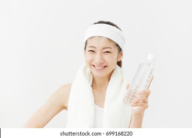 Asian woman drinking water