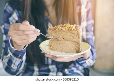 Asian Woman Eating Diet Cake. Lifestyle Of Happy Young Female Smiled And Enjoyed Eat Dessert At Coffee Shop. Diet Cake Concept.