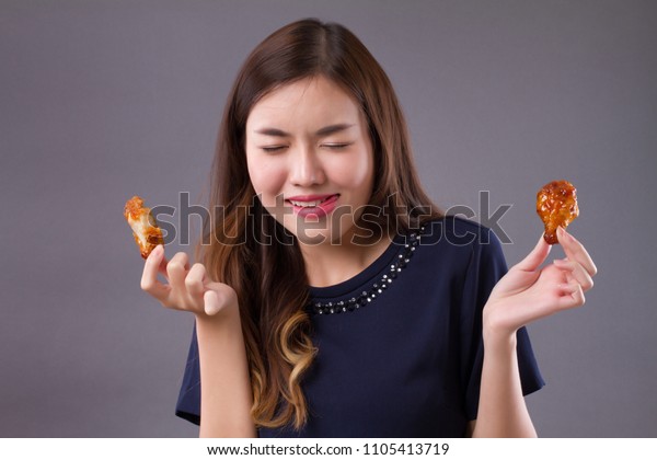 Asian Woman Eating Fried Chicken Portrait Stock Photo (Edit Now) 1105413719