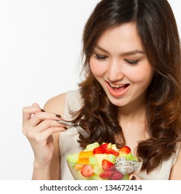 Asian Woman Eating Fruit Salad