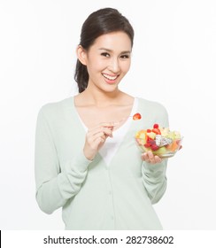 Asian Woman Eating Fruit Salad