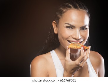  asian woman eats delicious pizza isolated over white background