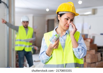 Asian Woman Engineer Crying, Disappointed By Low Salary. Conflict With Foreman In Construction Site.