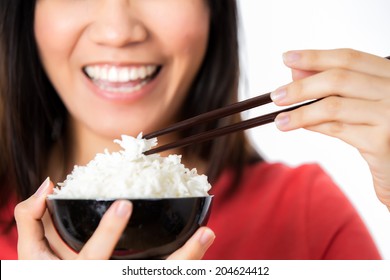 Asian Woman Enjoy Eating Rice