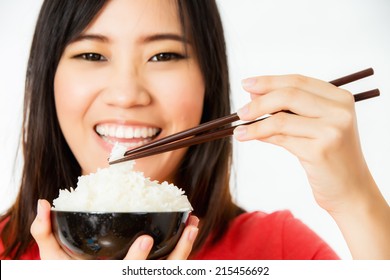 Asian Woman Enjoy Eating Rice Shooting In Studio