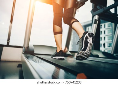 Asian Woman Exercising In The Gym, Young Woman Workout In Fitness For Her Healthy And Office Girl Lifestyle.