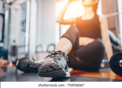 Asian woman exercising in the gym, Young woman workout in fitness for her healthy and office girl lifestyle.