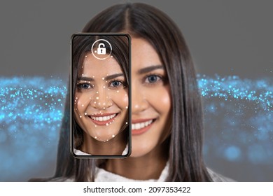 Asian Woman Face Detection And Recognition By Smart Mobile Phone For Unlock Over The Technology Background, Biometric Verification,  Computer Vision And Artificial Intelligence Concept