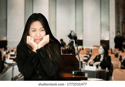 Asian Woman Fear To Public Speech To Audiece On Podium