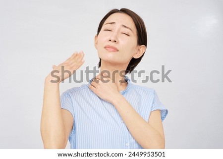 Asian woman feel so hot in white background