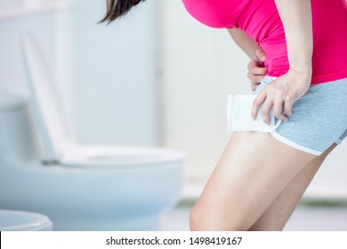 Asian Woman Feel Pain During Menstrual Cycle With Maxi Pad