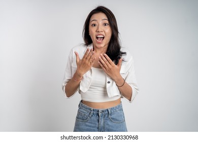 Asian Woman Feeling Shocked And Suprised Over Isolated Background