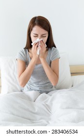 Asian Woman Feeling Unwell