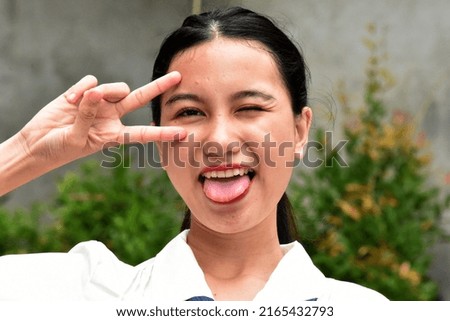 An Asian Woman Funny Face