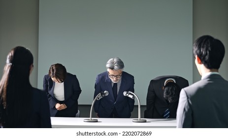 Asian Woman Giving An Apology Press Conference