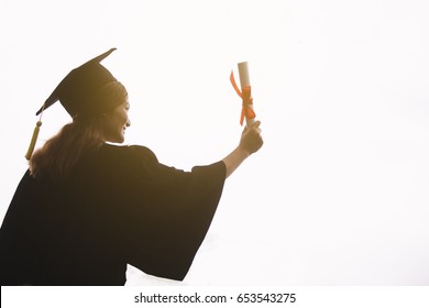 Asian Woman Graduation Day, Images Of Graduates Are Celebrating Graduation Put Hand Up, A Certificate And A Hat In Hand, Happiness Feeling, Commencement Day, Congratulation