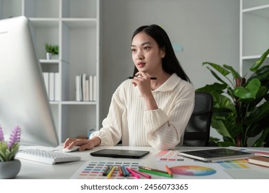 Asian woman graphic designer working in home office. Artist creative designer illustrator graphic skill concept - Powered by Shutterstock