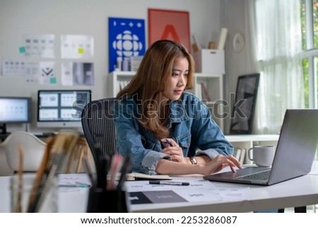 Asian woman Graphic designer working in office. Artist Creative Designer Illustrator Graphic Skill Concept.