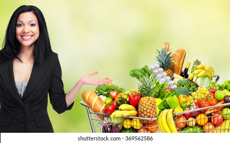 Asian Woman With Grocery Shopping Cart.