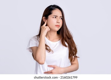 Asian Woman Has Pain In The Ear, Tinnitus Concept. Isolated On White Background.