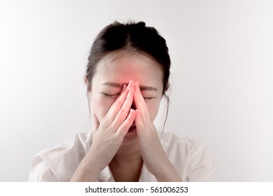 An Asian woman has a pain in nose or sinusitis (sinus infection), pain concept.