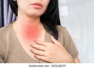 Asian Woman Have Problem With Acid Reflux Feeling Sore In Her Throat Hand Touching Her Neck 