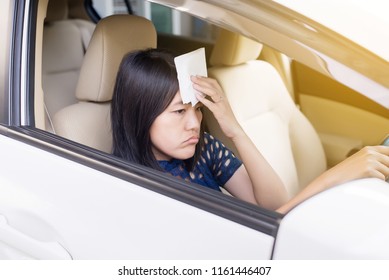 Asian Woman Having Hot A Heat Wave In Her Car,Because Broken Air Conditioner