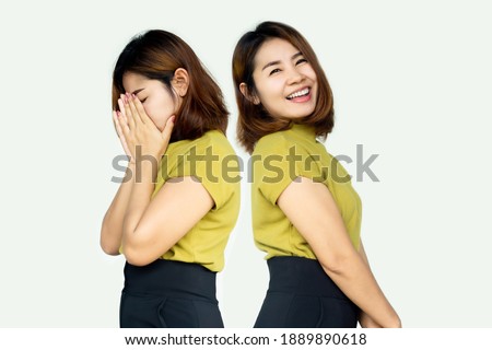 Asian woman having problem with two personality or bipolar with difference face  moody, sad and happy 