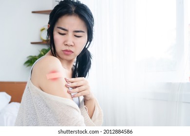 Asian Woman Having Side Effects With Allergy Rash Skin On The Shoulder After Vaccination For Covid-19 